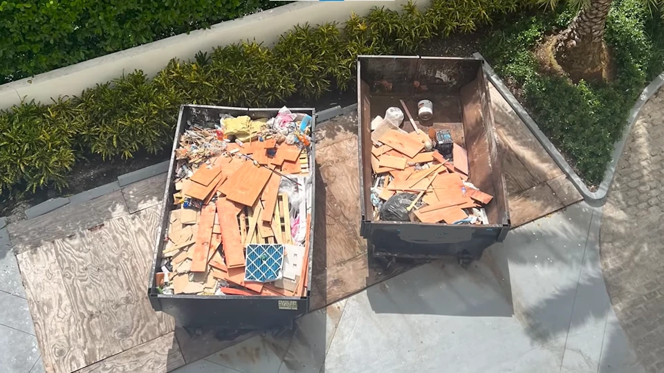 Different dumpster sizes lined up side by side for comparison